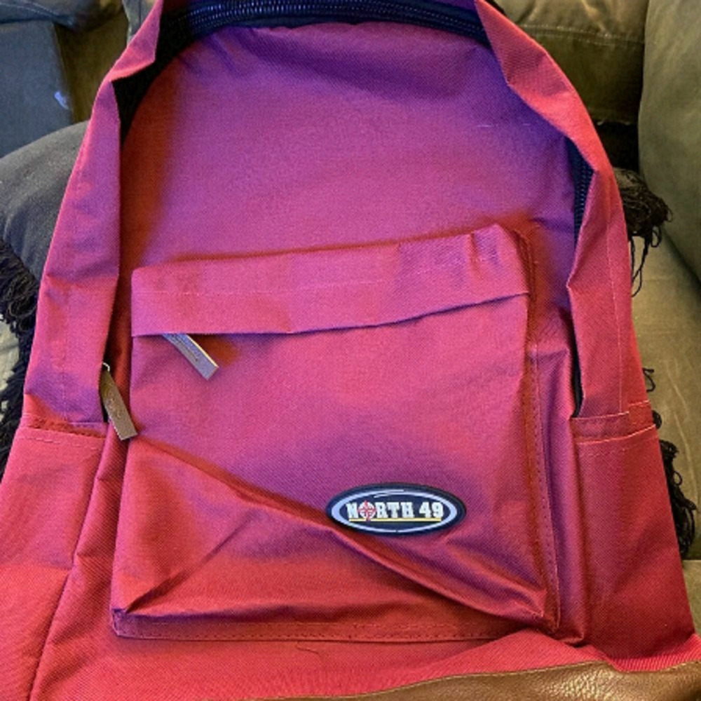 North 49 Knapsack. New, was full of gifts when received. Gifts not included